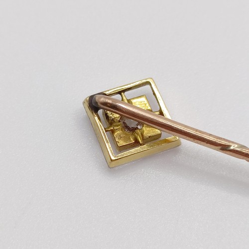 627 - A yellow coloured metal and diamond stick pin  Provenance:  From a single owner collection of Victor... 