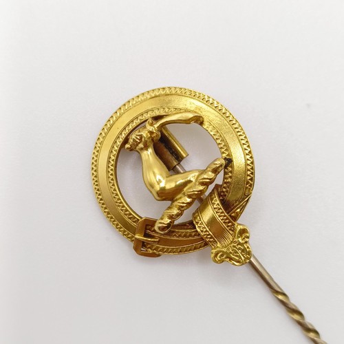 625 - A late 19th/early 20th century yellow metal stick pin, in the form of a belt  Provenance:  From a si... 