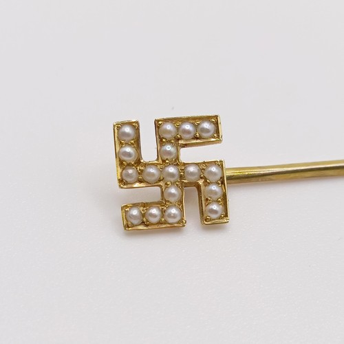 620 - A late 19th/early 20th century stick pin, decorated Mangi symbol Provenance:  From a single owner co... 