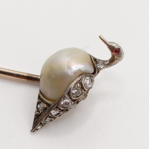 618 - An early 20th century yellow metal, diamond and pearl stick pin, in the form of a bird  Provenance: ... 