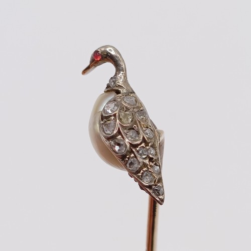 618 - An early 20th century yellow metal, diamond and pearl stick pin, in the form of a bird  Provenance: ... 