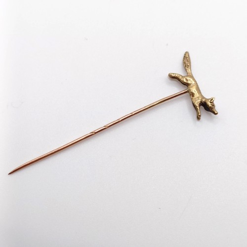 611 - A late 19th/early 20th century yellow metal stick pin, in the form of a fox Provenance:  From a sing... 