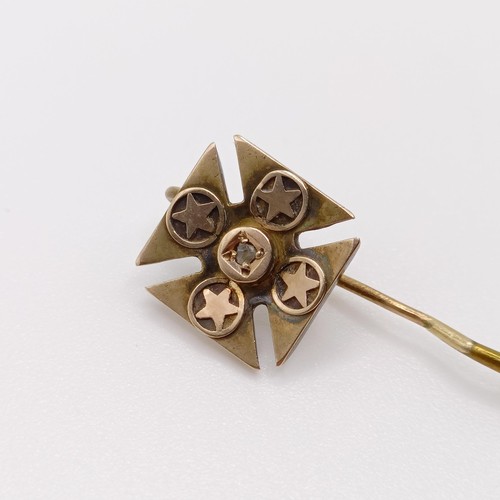 608 - A late 19th/early 20th century yellow metal stick pin, in the form of a cross  Provenance:  From a s... 