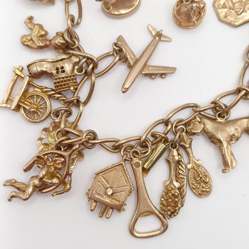 667 - A 9ct gold bracelet, with assorted charms, not all marked, untested, all in 56.5 g