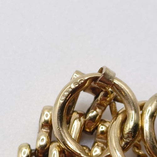 665 - A yellow metal bracelet, with a padlock clasp