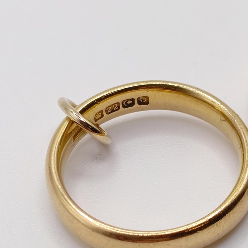 700 - A 22ct gold wedding band, and a 9ct gold wedding band