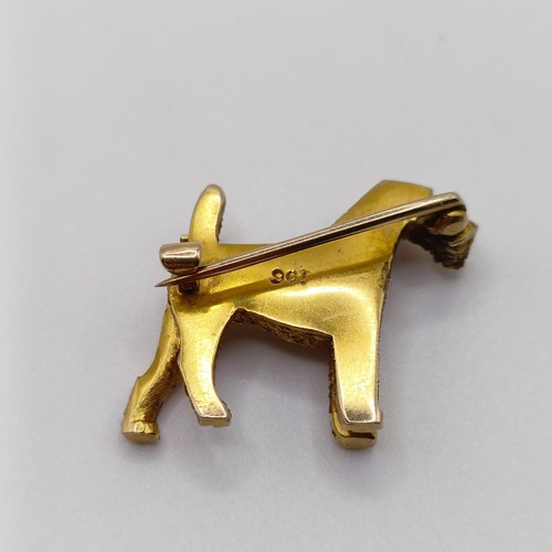 807 - A 9ct gold brooch, in the form of a terrier, 10 g 
Provenance:  Sold on behalf of the Tenovus Cancer... 