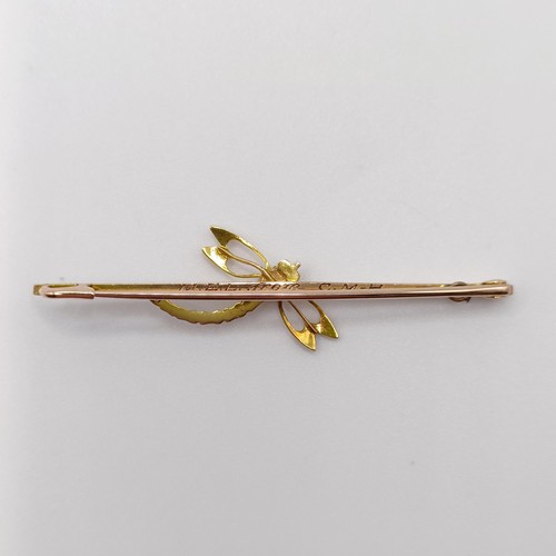 708 - A yellow coloured metal, purple stone and seed pearl bar brooch, in the form of a dragonfly