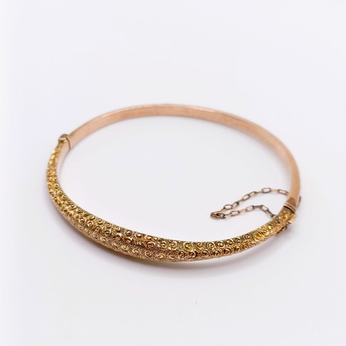 699 - A 9ct gold bangle, 4.8 g