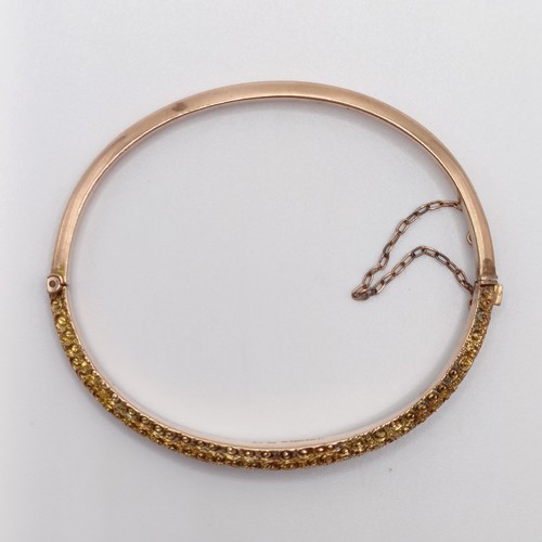 699 - A 9ct gold bangle, 4.8 g