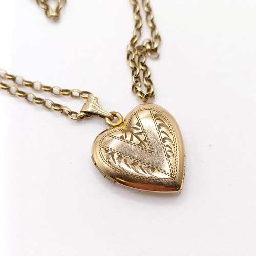 685 - A 9ct heart shaped locket, on a yellow metal chain