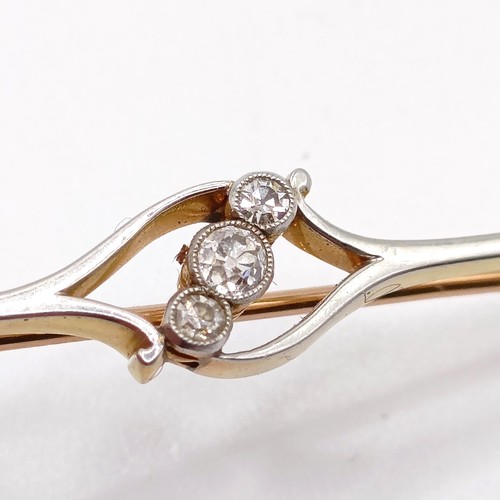 721 - A 15ct gold and diamond bar brooch