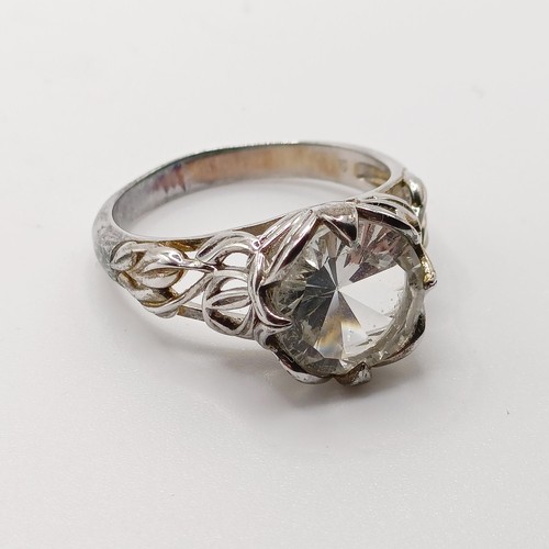 723 - A silver and white stone dress ring, and assorted other dress rings