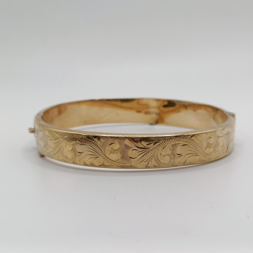 725 - A 9ct gold bangle, 12.7 g