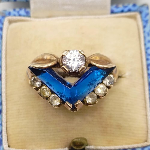 748 - A 1940's style yellow metal, white and blue stone ring, ring size M, in a vintage jewellery box