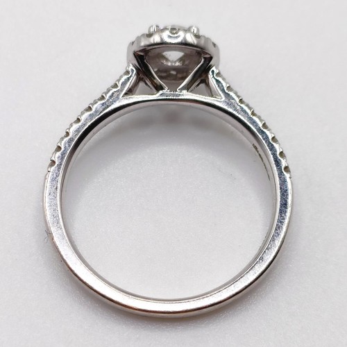 749 - An 18ct white gold and diamond ring, ring size N