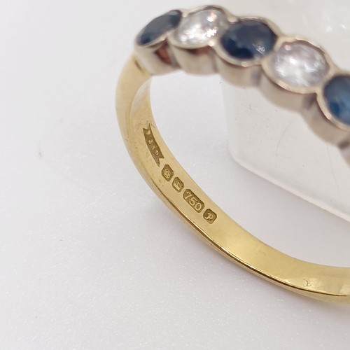 752 - An 18ct gold, diamond and sapphire ring, ring size J