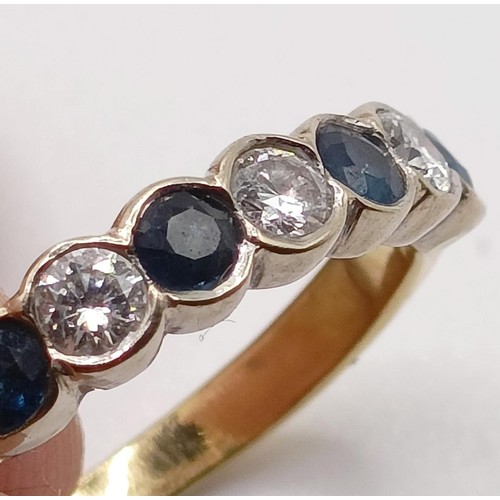 752 - An 18ct gold, diamond and sapphire ring, ring size J