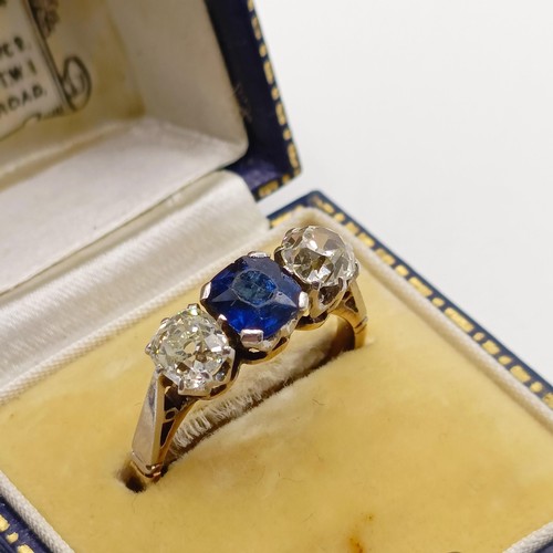 768 - An 18ct gold, sapphire and diamond three stone ring, ring size N, in a vintage jewellery box, retail... 