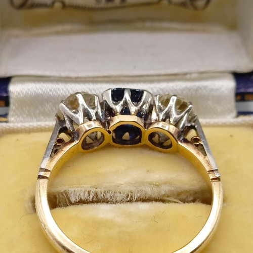 768 - An 18ct gold, sapphire and diamond three stone ring, ring size N, in a vintage jewellery box, retail... 