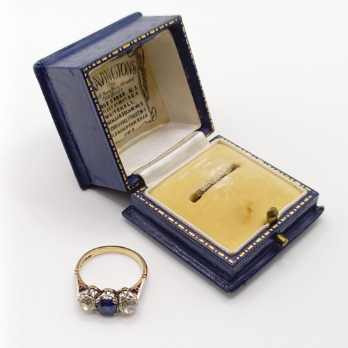 768 - An 18ct gold, sapphire and diamond three stone ring, ring size N, in a vintage jewellery box, retail... 