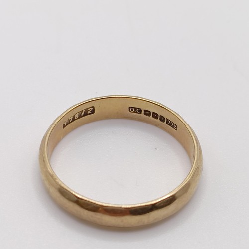 769 - A 9ct gold wedding band, ring size U, 3.6 g