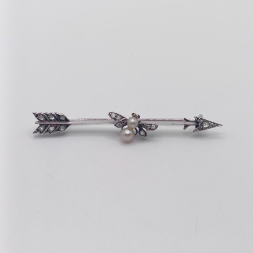 776 - A late 19th early/20th century white metal diamond and pearl bar brooch, in the form of a bee perche... 