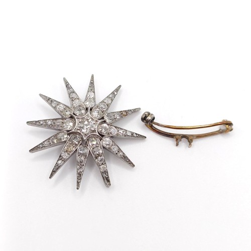 777 - A late Victorian diamond star pendant/brooch, with a loose fitting, 3.5 cm diameter