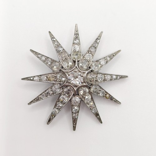 777 - A late Victorian diamond star pendant/brooch, with a loose fitting, 3.5 cm diameter