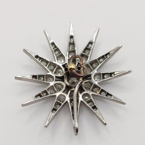 777 - A late Victorian diamond star pendant/brooch, with a loose fitting, 3.5 cm diameter