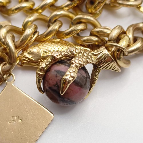 778 - A gold plated chain with an assortment of 9ct gold, and yellow coloured metal charms, all in 46.3 g