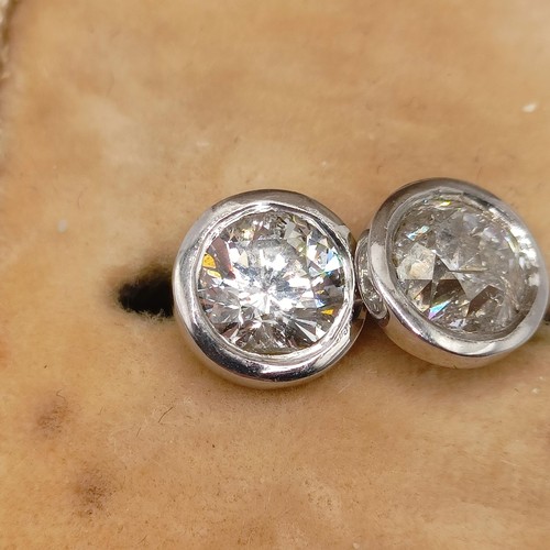 938 - A pair of diamond ear studs, approx. 1ct each