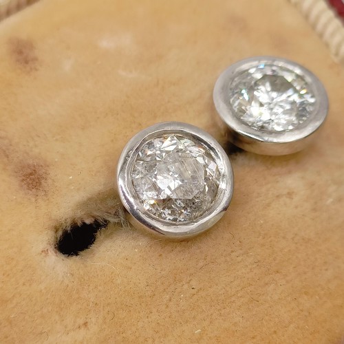 938 - A pair of diamond ear studs, approx. 1ct each