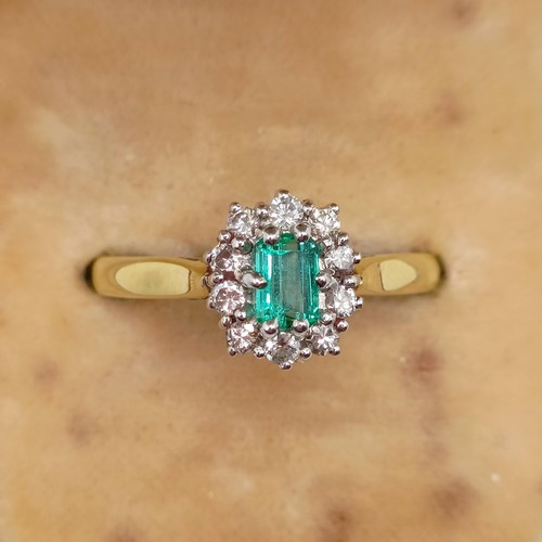 937 - An 18ct gold, emerald and diamond cluster ring, ring size M, and a dress ring, in a vintage jeweller... 