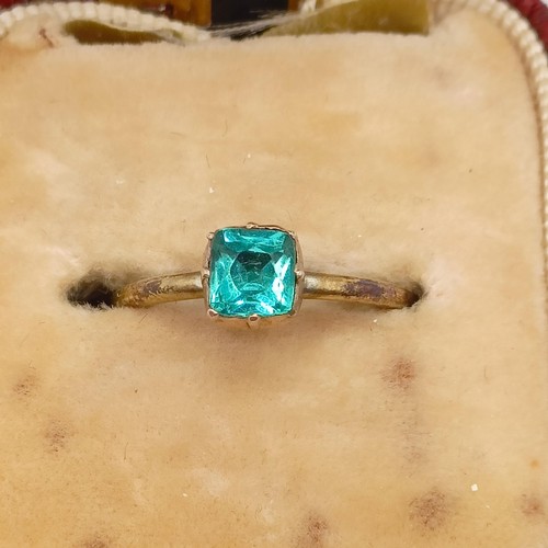 937 - An 18ct gold, emerald and diamond cluster ring, ring size M, and a dress ring, in a vintage jeweller... 