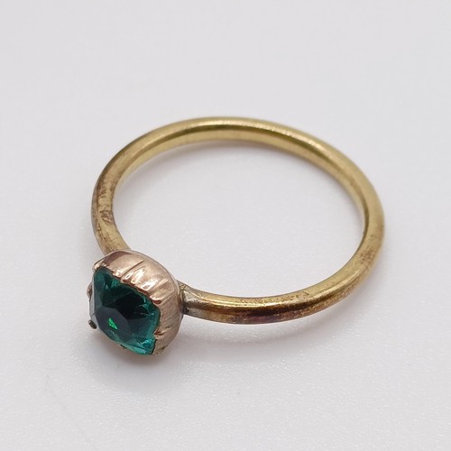 937 - An 18ct gold, emerald and diamond cluster ring, ring size M, and a dress ring, in a vintage jeweller... 