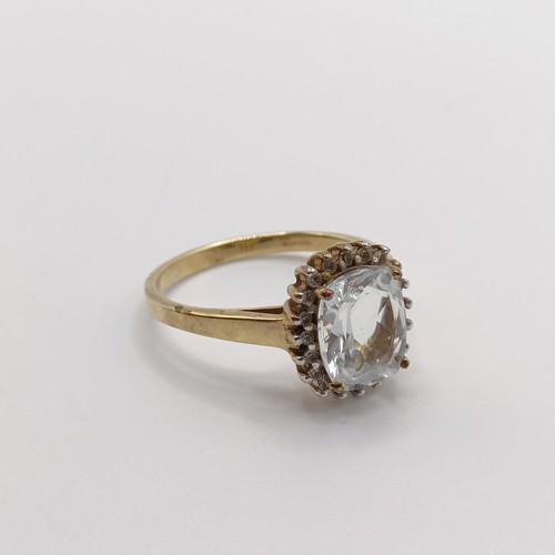 936 - A 9ct gold and white stone ring, ring size S