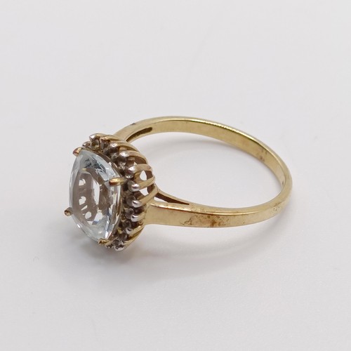 936 - A 9ct gold and white stone ring, ring size S