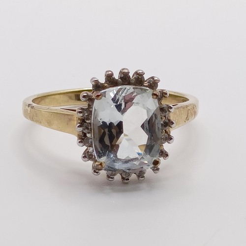 936 - A 9ct gold and white stone ring, ring size S