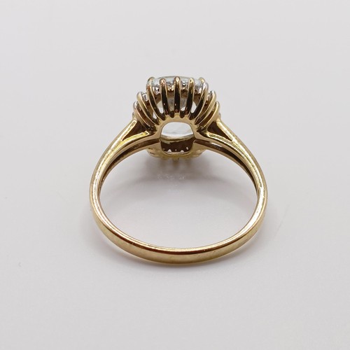 936 - A 9ct gold and white stone ring, ring size S