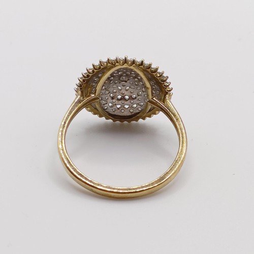 934 - A 9ct gold and diamond ring, ring size R