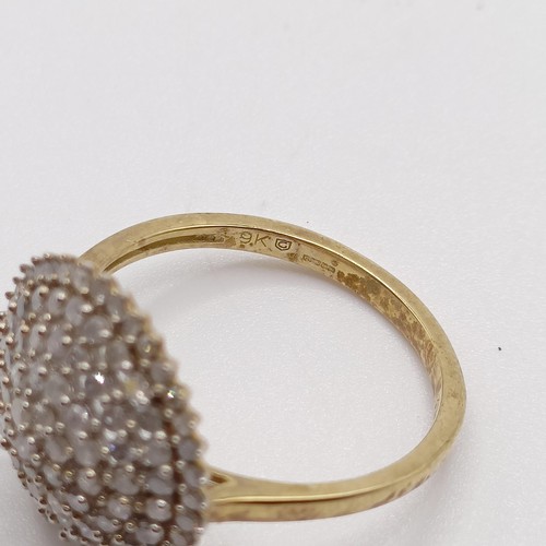 934 - A 9ct gold and diamond ring, ring size R