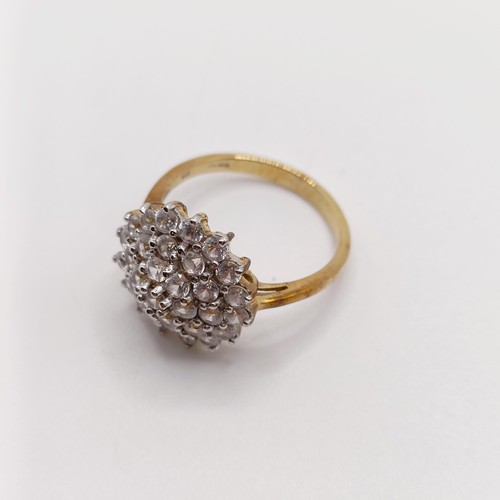 928 - A 9ct gold and diamond cluster ring, ring size S