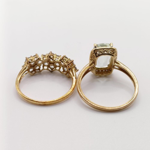 924 - A 9ct gold, blue stone and diamond ring, ring size S, and a 9ct gold and white stone ring, ring size... 