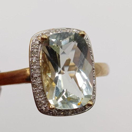 924 - A 9ct gold, blue stone and diamond ring, ring size S, and a 9ct gold and white stone ring, ring size... 