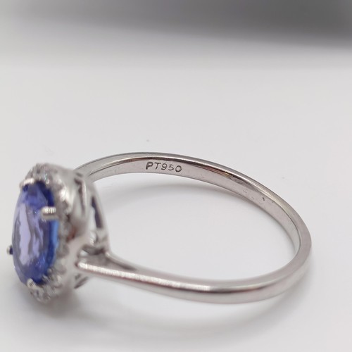 920 - A 9ct white gold, tanzanite and diamond ring, ring size T, with certificate