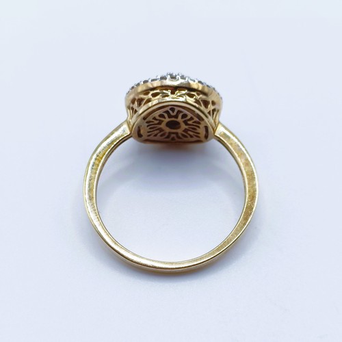 918 - A 9ct gold and diamond cluster ring, ring size S