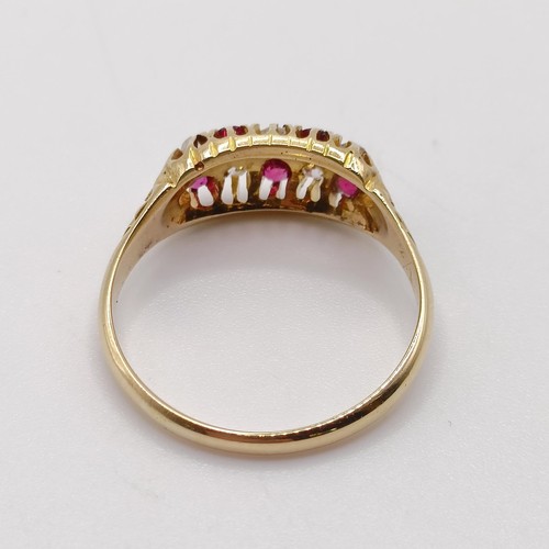 905 - An 18ct gold, ruby and diamond ring, ring size P