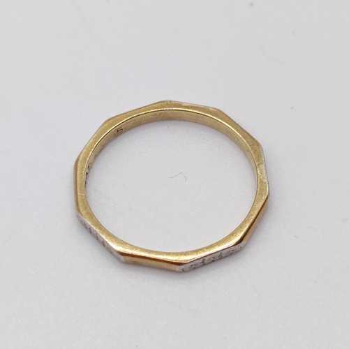 893 - A 9ct gold and platinum wedding band, ring size K 1/2, 1.5 g