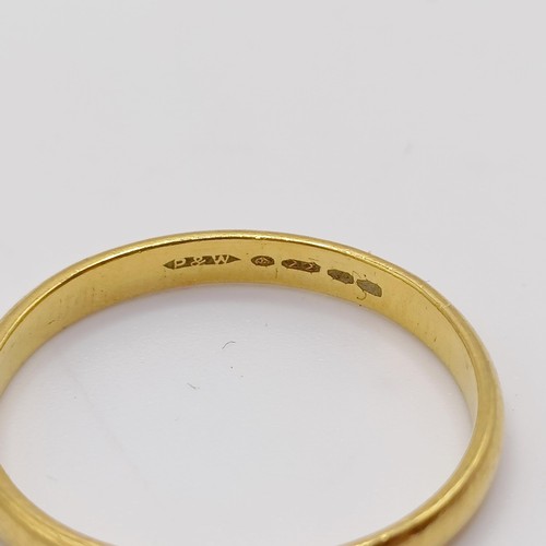 882 - A 22ct gold wedding band, ring size P, 2.9 g